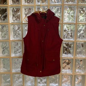 Faux fur with zip off hood vest.